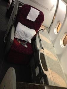 First Class Seat - Not much of a difference except for the large counter on the side